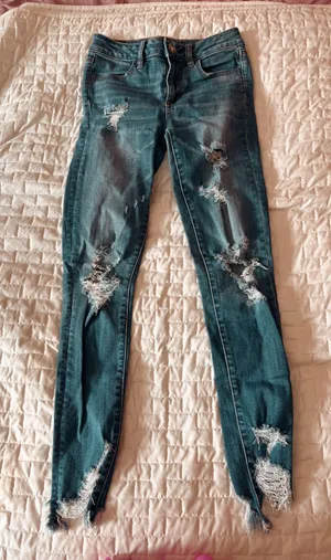 American Eagle Super Stretch High Rise Distressed Jegging Size 0 Regular thumbnail 1