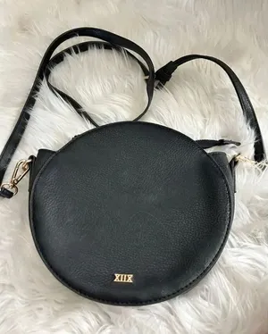 Collection XIIX Black Leather Pocket Adjustable Strap Round Crossbody Bag thumbnail 1