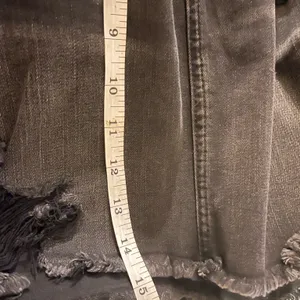 American Eagle Outfitters Distressed Black Denim Hi-Rise Skirt Size 4 thumbnail 8