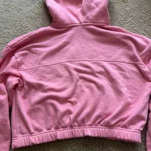 ALO Stadium Half Zip Hoodie in Macaron Pink thumbnail 11
