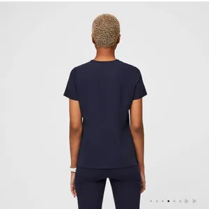 Like new by figs Casma Three-Pocket Scrub Top™ Navy Blue Women's V-Neck Top thumbnail 2