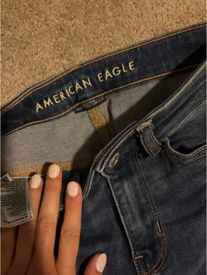 Stretchy high waisted, American Eagle light wash denim pants thumbnail 2