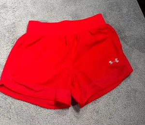 Under Armour Women’s Red Athletic Shorts loose XS thumbnail 1