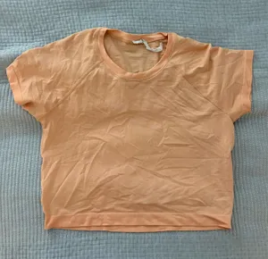Orange Lululemon Top Swiftly Tech thumbnail 1