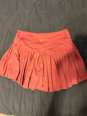 Pleated Gold Hinge Tennis Skirt in Magenta thumbnail 2
