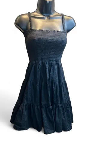 Steve Madden Smocked square neckline with thin straps. Tiered A-line skirt for movement. Lightweight, breathable fabric. Easy to dress up or down. thumbnail 1