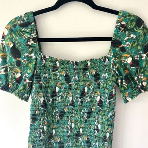 Anthropologie Dolan Left Coast Smocked Puff Sleeve Green Toucan Print Top Floral thumbnail 9