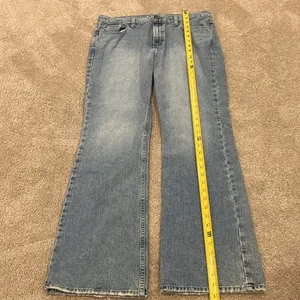 Old Navy women’s boot-cut low waist jeans size 12. thumbnail 7