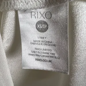 RIXO Bridal Libby Ivory Satin Bow Sleeveless Mini Dress Size XS thumbnail 12