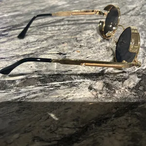 Round Gold and Black Sunglasses thumbnail 9