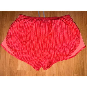 Nike Dri-FIT Women Running Shorts Orange Red Wave Print Mesh Large thumbnail 3
