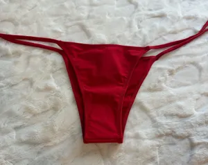 Tropic Of C Women’s Red Bikini Bottom - Sleek Strappy Size Small . NWT . thumbnail 1