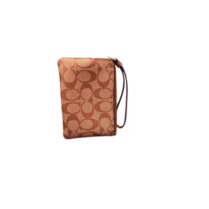 Coach Corner Zip Wristlet in Signature Canvas in KHAKI thumbnail 4