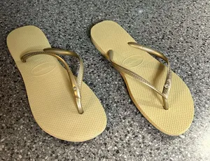 Havaianas Slim Flip Flops in Metallic Gold thumbnail 1
