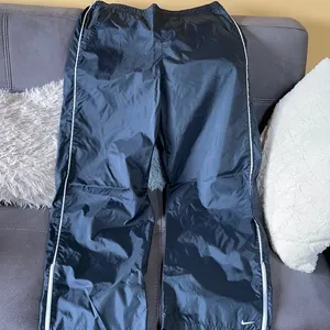 NIKE Black Waterproof Exercise Pants Size Large thumbnail 1