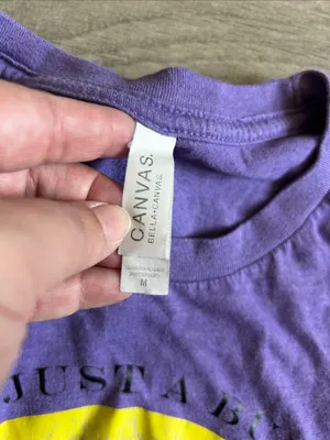 Bella Canvas Purple Short Sleeve Tee with Yellow 'Hocus Pocus' Graphic thumbnail 2