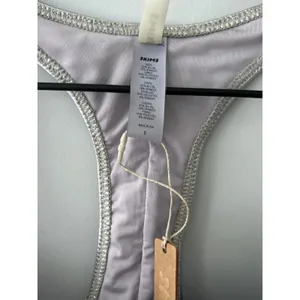 Skims Women Nickel Metallic Swim Cycle Suit NWT Size S ( Sold Out) thumbnail 8