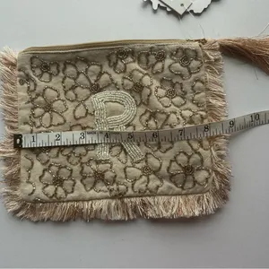 Elegant Floral Beige Clutch with Fringe Anthropologie thumbnail 5