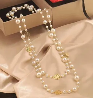 Elegant Gold and Pearl Long Necklace thumbnail 1