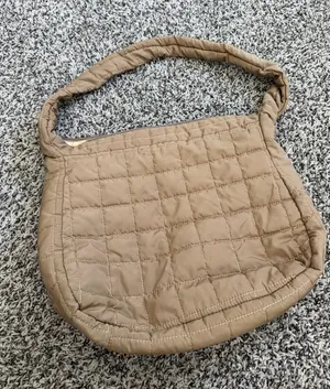 Puffy tan purse thumbnail 1