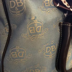 Dooney & Bourke East West Canvas / Leather Trim Donegal Crest Tote Shoulder Bag thumbnail 15