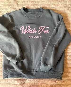 White Fox Sweater Boutique thumbnail 1