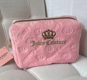 NWT Juicy Couture Pink Embossed Cosmetic Case. thumbnail 1