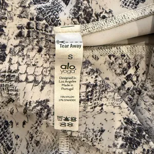 ALO Yoga Cream and Black Snakeskin Leggings thumbnail 3
