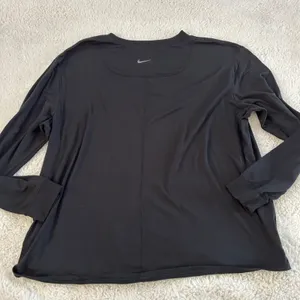 Nike Women’s Black Dri-Fit Long Sleeve Shirt L Yoga Athleisure Luxe Preppy Yoga thumbnail 3