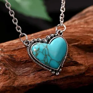 Cute cowgirl/western style silver chain with cute turquoise heart center… thumbnail 1