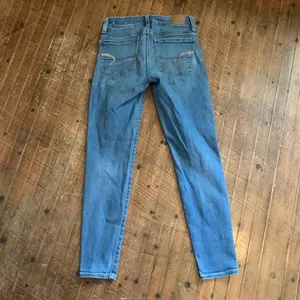 American Eagle medium wash 00 short distressed jeggings thumbnail 4