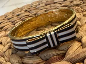 Coach Gold-tone Navy & White Striped Bow Bangle Bracelet thumbnail 1