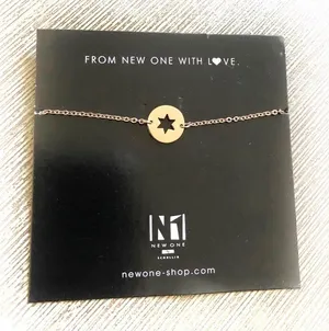 Gold tone star bracelet thumbnail 1