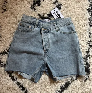 Princess Polly Criss-Cross Jean shorts thumbnail 1