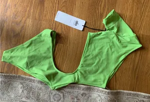 NWT ALO Yoga Neon Green Body Suit Women Size XXS Athletic Short Sleeve New thumbnail 1