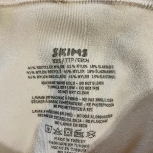 SKIMS Strapless Sculpting Shortie Bodysuit thumbnail 3