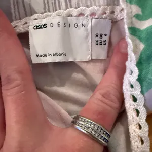 ASOS DESIGN mini corset dress Size 6 with trim detail in pastel floral. thumbnail 5