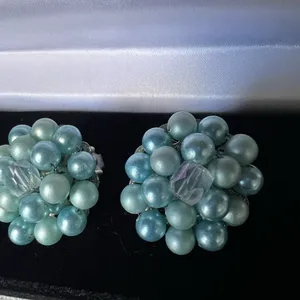 vintage 1950s-1960s cluster clip-on earrings, featuring blue faux pearl thumbnail 3