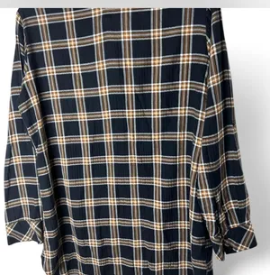 Classic Sanctuary navy plaid tunic-style button front shirt featuring a relaxed fit, chest pockets, and roll-tab sleeves for versatile styling. Lightweight and easy to wear with leggings, denim, or layered over a tank. Great casual staple for fall and transitional seasons thumbnail 3