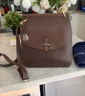 Dooney and Bourke flip tab Alto messenger crossbody thumbnail 1