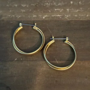 Brushed gold tone intertwined hoop earrings thumbnail 6