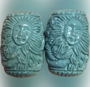 Carved Sun Face/Mermaid Turquoise Color Resin Beads - set of 2 thumbnail 1