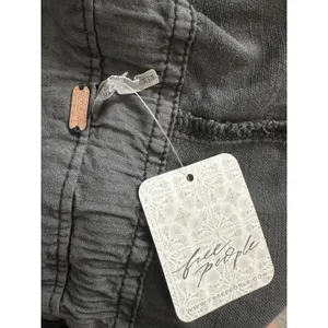 Free People Overall Shorts In dark grey featuring a zipper closure Size Medium thumbnail 10