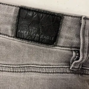 American Eagle hi-rise Jegging Grey distressed jeans. thumbnail 3