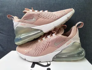 Women’s Nike rose gold pink running sneakers size 8. thumbnail 1