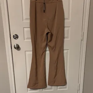 Nasty Gal Fluid Flare tan khaki Trousers Uk 12 US 8 new with tags thumbnail 4