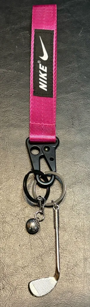 Nike Fuchsia Key Chain W/ Black Logo Patch w/ Silver Golf Club & Golf Ball NWOT thumbnail 1