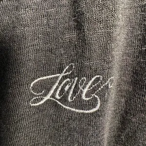 B79. Victoria's Secret black long sleeve top with "Love" embroidery. Size L thumbnail 2