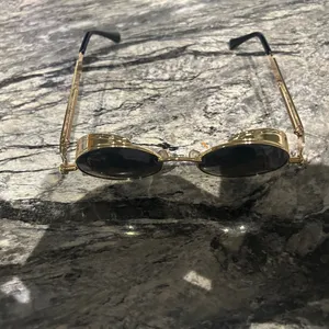Round Gold and Black Sunglasses thumbnail 11