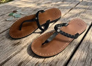 UGG Women's Tan Leather Flip Flops with Black Braided Straps thumbnail 1